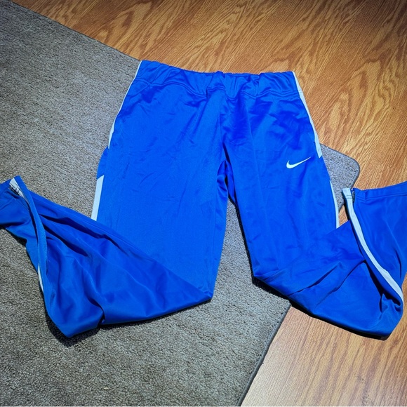 Women’s Nike track pant size medium.  Blue Bx12 - Picture 1 of 6